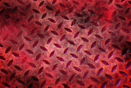 Rough metal texture in dark red colors