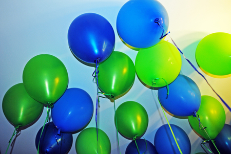 some green and blue balloonsの写真素材