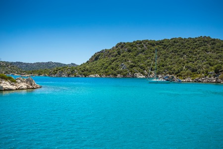 Turkey landscape with blue sea, sky, green hills and mountainsの写真素材