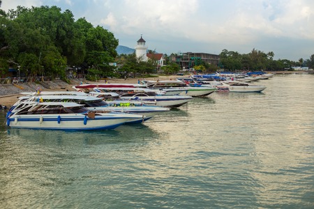 Speedboat on the pier for traveling around the islandの写真素材