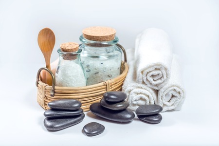 Spa and wellness setting with Zen stones, natural soap, sea salt and towel.の写真素材