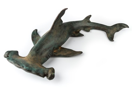 Decorative statuette hammerhead shark, isolated on white background.の写真素材