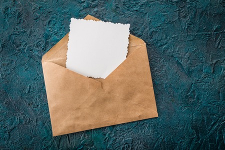 Blank card and envelope on olddark backgroundの写真素材