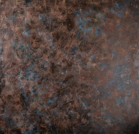 Rusty brown concrete background of stone with blue spots.の写真素材