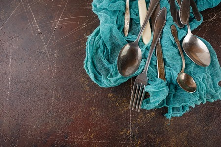 Metal kitchen utensils - forks, spoons of knivesの写真素材