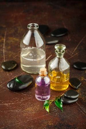 Glass bottles with liquid soap, shampoo and shower gel. Set for relaxation, body care and aromatherapyの写真素材