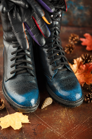 Fashion trend autumn winter. Autumn women's shoes and glovesの写真素材