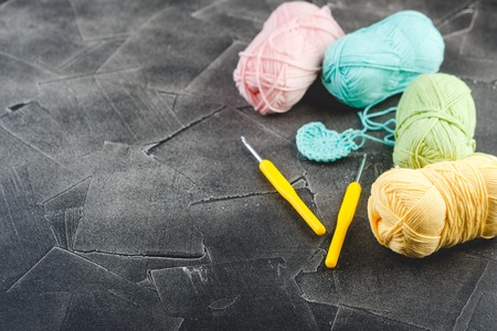 Colored skeins of yarn for crocheting or knitting, delicate colors, wool blend with cottonの写真素材