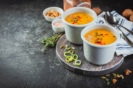 Pumpkin soup with smoked paprika, leek, walnuts and parmesan cheeseの写真素材