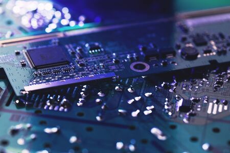 Close-up of electronic circuit board with processor. Electronic computer hardware technology. Tech science background.の写真素材