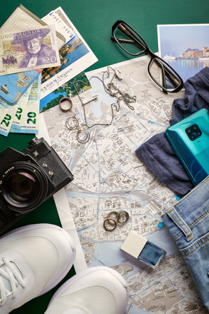 Flat lay accessory women outfit to plan travel in holiday background concept. Top view travel concept.のeditorial素材