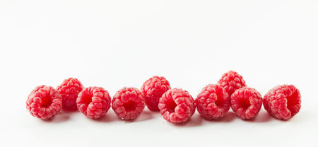 Raspberries on white background, long wide bannerの写真素材
