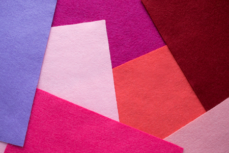 Fan of colored bright felt textile material. Samples of soft felt flaps in different colours. Felt craft abstract handicraft background for handmade and creativeの写真素材
