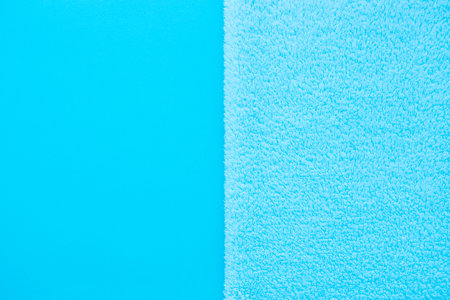 Vertical Background of two types of blue fabric - smooth and fluffy. Baby blue Soft fabric pastel...