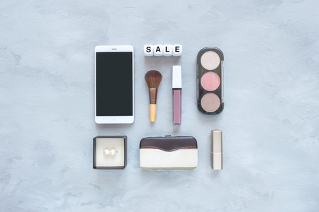 Trendy stylish fashion Shopping mockup, banner. Feminine fashion background with jewelry, women's accessories, cosmetics and shopping bag. Copy spaceの写真素材
