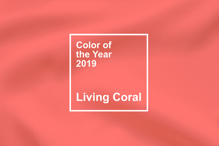 KROPIVNITSKIY, UKRAINE  â 06 December, 2018: Living Coral, Pantone color of the year 2019 fabric textile background. Living Coral textural brick wall, color swatchのeditorial素材