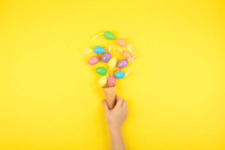 Easter composition, greeting card with child hand, lightbox text Happy Easter, colored decorative...