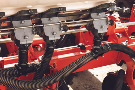 Working parts of new agricultural seeder, seeding machine. Agricultural machinery. 