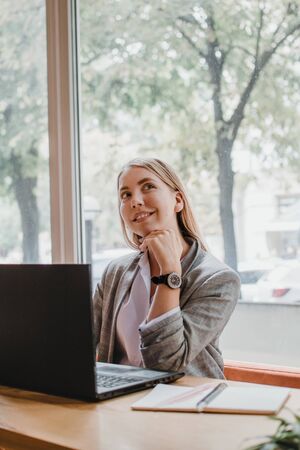 Distance learning during the coronavirus outbreak. Young teenage female student preparing for exams at home .の写真素材