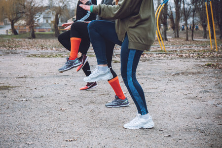 Outdoor gym fitness classes, outside workout. Fitness in the fresh air. Safer outside. Group fitness...