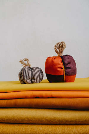 Small Fabric Knit Decorative Pumpkin. Handmade, Autumn Fall Decor, Thanksgiving and Halloween Table Decor. DIY Crafts, How to Make Handmade Pumpkin out of Fabric for Home Decor Tutorial.の写真素材
