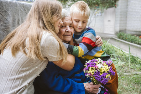 Family groups, multigenerational households, great-grandmother and great-grandchildren. Candid...