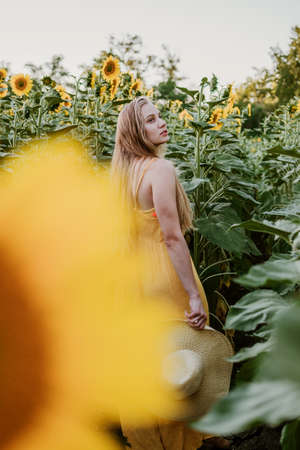 Mindfulness, positive mind, living in present moment, slow life, Mindfulness practice, reduce depression. Outdoor portrait of Young blonde woman on nature backgroundの写真素材