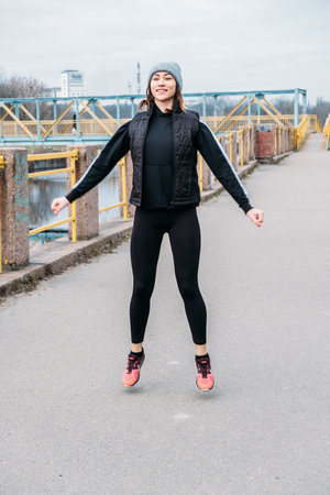 Running Warm Up, Warming Up Before Run, Prerun Warmup. Sporty woman stretching legs before jogging....