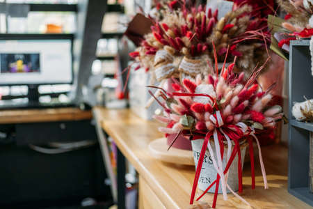 Natural Dried Lagurus Ovatus Flowers, Bouquet with color Rabbit Tail Dried Pampas Flowers in flower florist shop, boutique. Decoration for Home and Wedding Decor Floral Arrangementsの写真素材