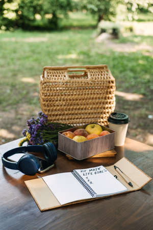 New Years Resolutions Life Goals list in open notebook on the table. Outdoor still life with My Life Goals motivational text. Self-development and motivationの写真素材