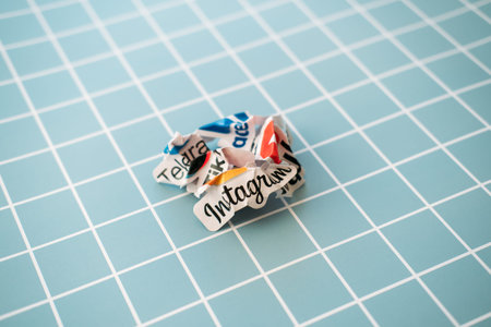 Social media addiction, detox, fomo. Crumpled Paper logos of social networks and online messengers...