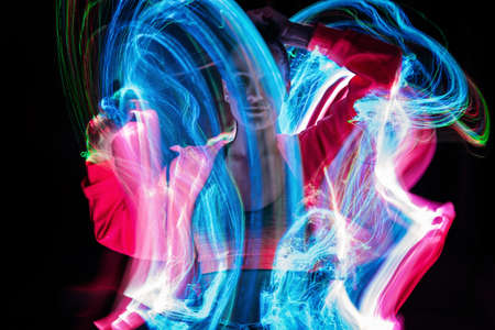 Metaverse digital Avatar, Metaverse Presence, digital technology, cyber world, virtual reality, futuristic lifestyle. Woman in augmented reality,  game with neon blur linesの写真素材