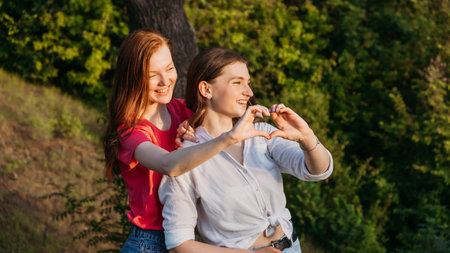 Friendship, meeting, togetherness, greetings, gathering of friends. Group of girls friends cheering...
