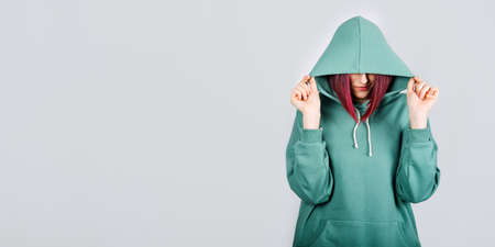 Studio shot of purple hair Hoody woman in long sleeve tracksuits hoodie activewear setの写真素材