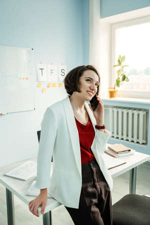 Young professionals, gen z working, first job. Confident young businesswoman workingの写真素材