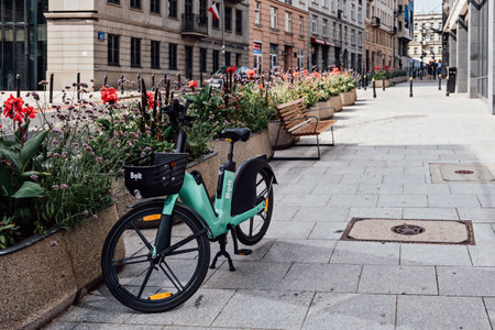Bolt Electric bicycles, City Bicycle Bolt in street. Sharing electrical bikes. Shared cars, bicycles and scooters Warsaw, Poland - September 02, 2022のeditorial素材