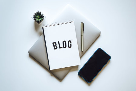 Blogging for Beginners. How To Start Blog. Word blog and Laptop, Mobile Phone, notebook and glasses...
