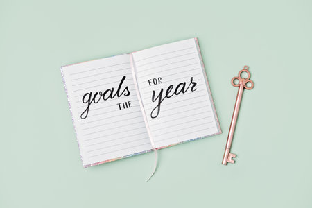 Goals for the year 2023, New year resolution. Text Goals for the year in open notepad on the table. Start new year, planning and setting plans for the next year.の写真素材