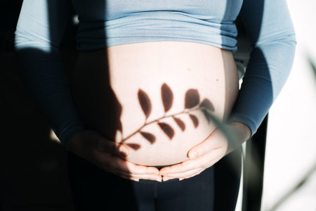 Mental health and wellbeing during pregnancy. Pregnant woman preparing to yoga and meditation...
