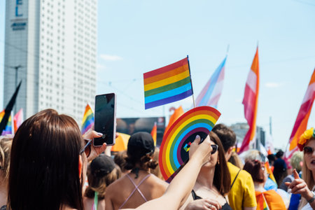 LGBT parade, pride month in Warsaw. Activists Gay, lesbians, trans, hetero people in LGBT Pride Parade march for LGBTQ rights. Equality Parade. Warsaw, Poland, June 25, 2022.のeditorial素材