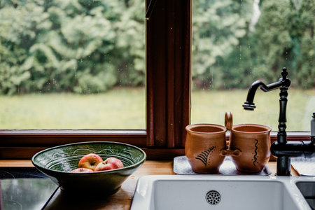 Cottagecore interior design. romantic, nature-driven home kitchen design trend for cozy spaces decorated with rustic touches. ottagecore rural livingの写真素材