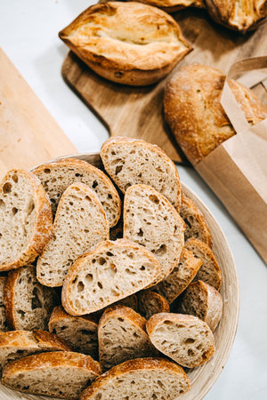 Fresh Sliced Wholegrain Bread in Bowl. Artisan bread low-in salt, sugar and fatの写真素材