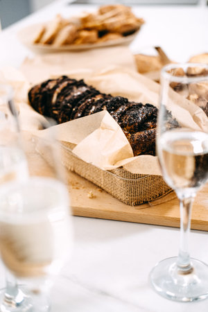 Elegant Bread and Wine Pairing on Dining Table