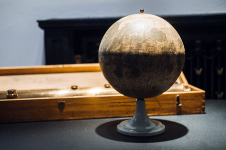 Warsaw, Poland - March 19, 2024. Vintage Globe with Wooden Carrying Case