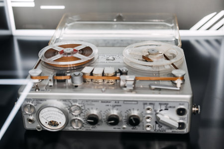 Warsaw, Poland - March 19, 2024. Classic Reel-to-Reel Tape Recorder Equipmentのeditorial素材