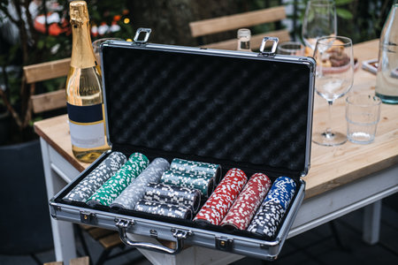 Poker Chips Set with Champagne on Tableの写真素材