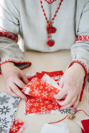 Holiday-themed fabric with snowflake patterns. Promoting sustainable gift wrapping, eco-friendly...