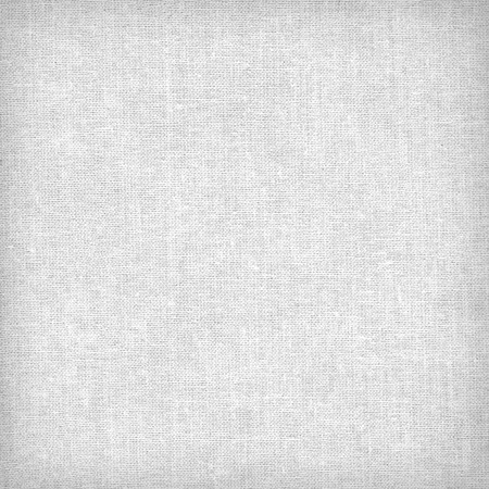 Canvas fabric white texture or background with delicate vignetteの写真素材