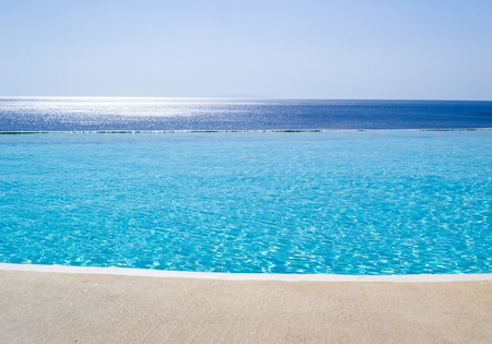  Infinity swimming pool with a view on Aegean Sea, Crete, Greeceの写真素材