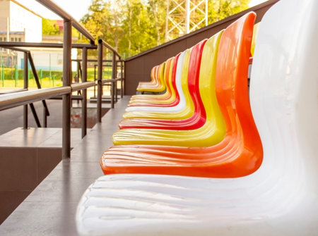 Colored stadium seats in a row